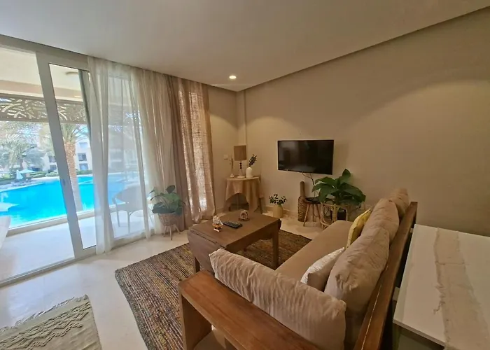 Mangroovy Serene Poolside Escape Cozy 2br Wz Games شقة
